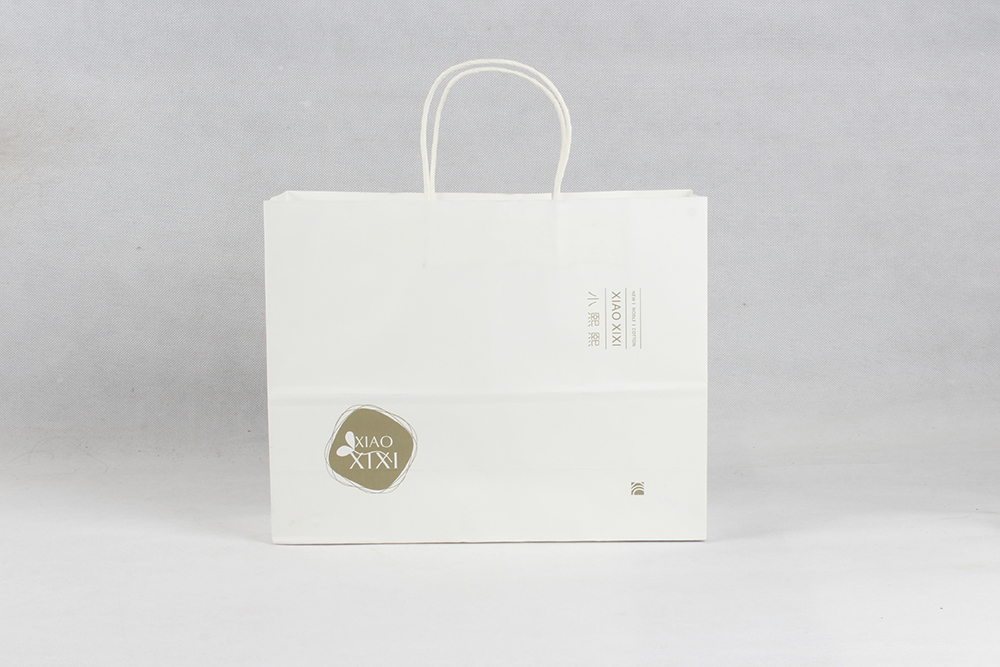 小熙熙精致服裝牛皮紙袋定制 小熙熙精致服裝牛皮紙袋定制