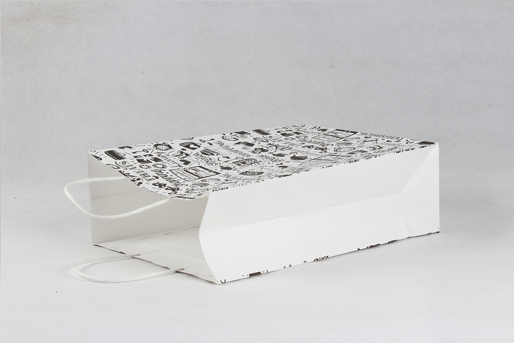 黑色卡通個(gè)性服裝牛皮紙袋定制 黑色卡通個(gè)性服裝牛皮紙袋定制